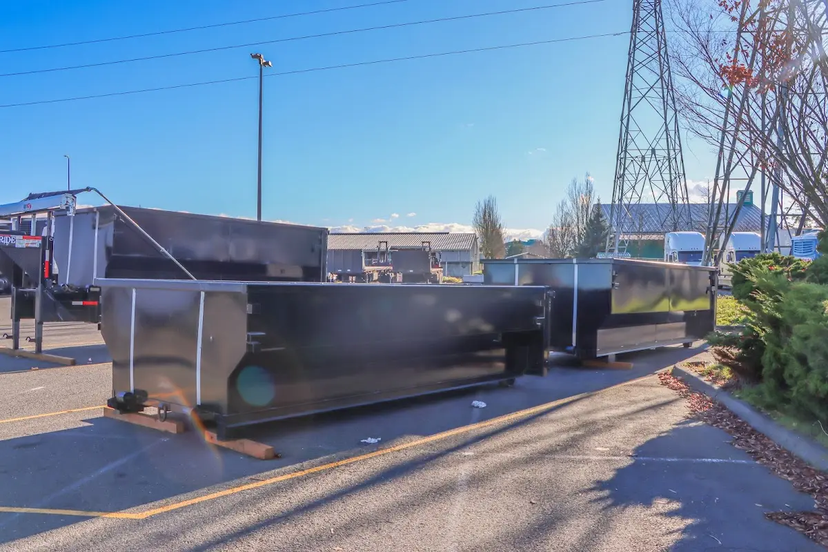 Roll-off dumpster ready for waste disposal at job site for Roofing Dumpster Rental in Florence